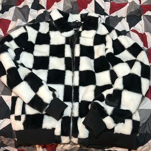 White and black fur bomber jacket 🔥